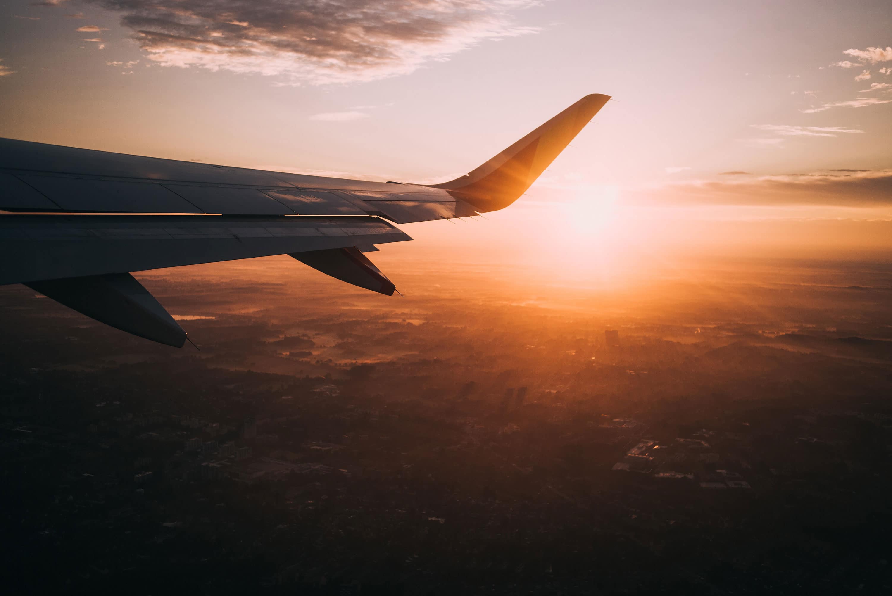 plane and sunset